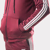 Maroon Tracksuit With Three White Stripes