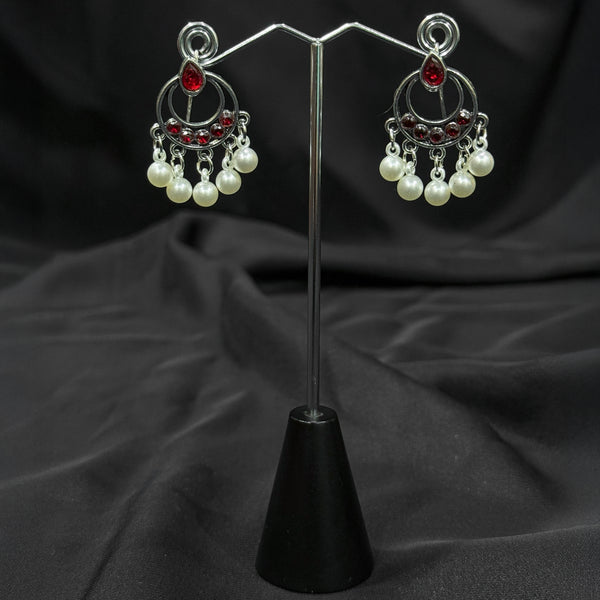 Silver plated Earrings With Red pearls.