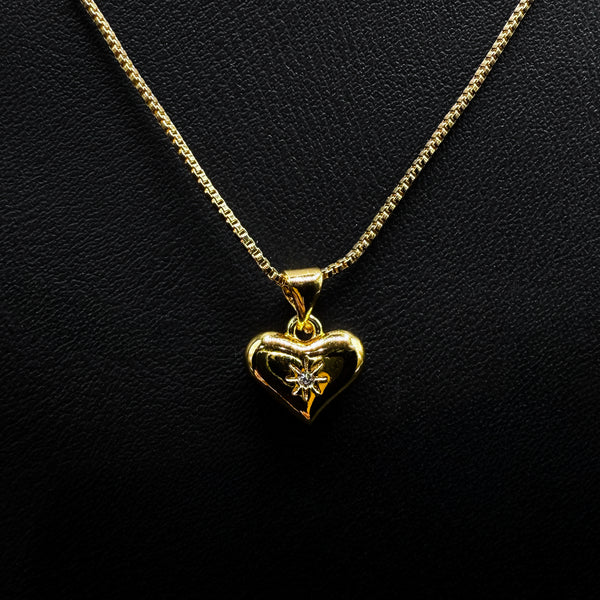 Gold heart pendant necklace