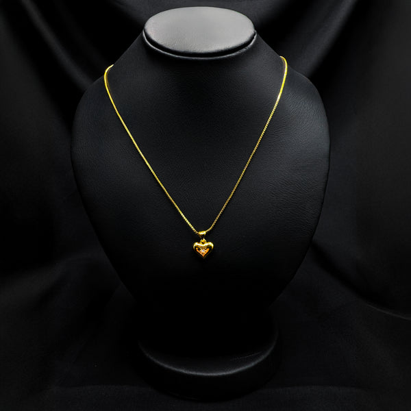 Gold heart pendant necklace