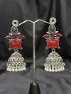 Silver Jhumka Earrings With Red Stone
