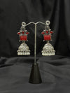 Silver Jhumka Earrings With Red Stone