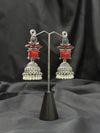 Silver Jhumka Earrings With Red Stone