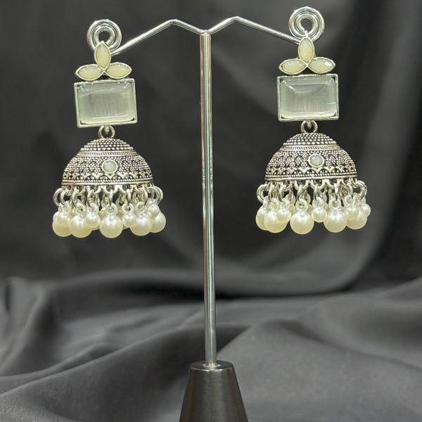 Silver Jhumka Earrings With White Stone