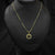 Gold Necklace With Central Black Gemstones