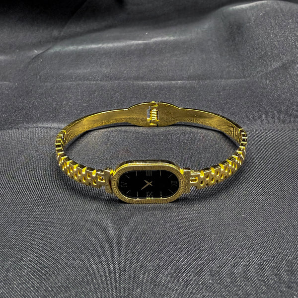 Gold toned watch style bracelet