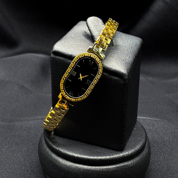 Gold toned watch style bracelet