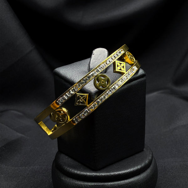 Gold plated Bangal with floral motif